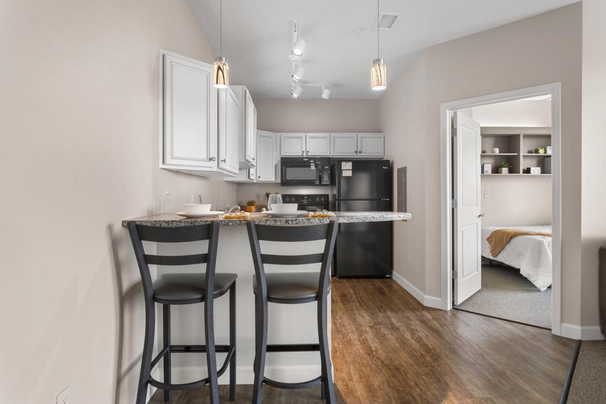 Dining and Doorway to Bedroom 2