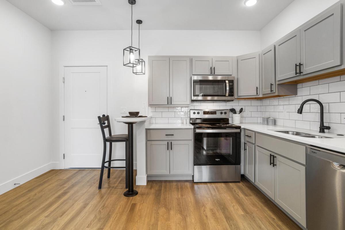 Entryway, dining, and kitchen